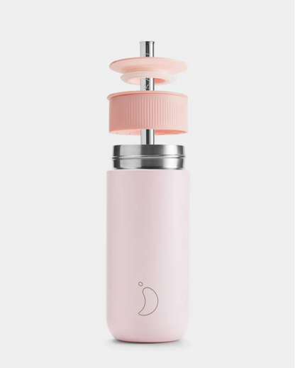 A 500 mL pink reusable insulated stainless steel bubble tea/ boba cup bottle by the brand Chillys.