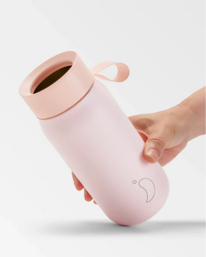 A 750 mL pink reusable insulated stainless steel bubble tea/ boba cup bottle by the brand Chillys.