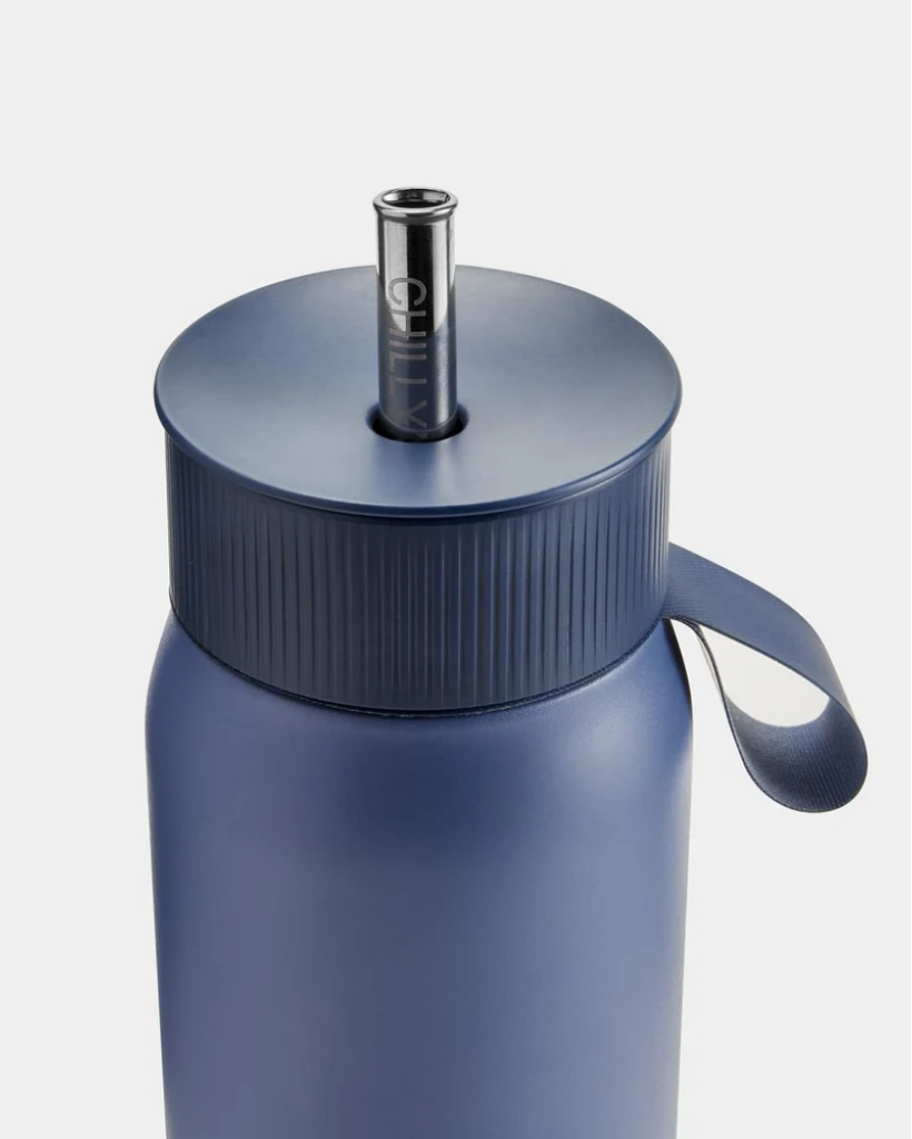 A 750 mL blue reusable insulated stainless steel bubble tea/ boba cup bottle by the brand Chillys.