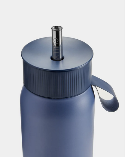 A 750 mL blue reusable insulated stainless steel bubble tea/ boba cup bottle by the brand Chillys.