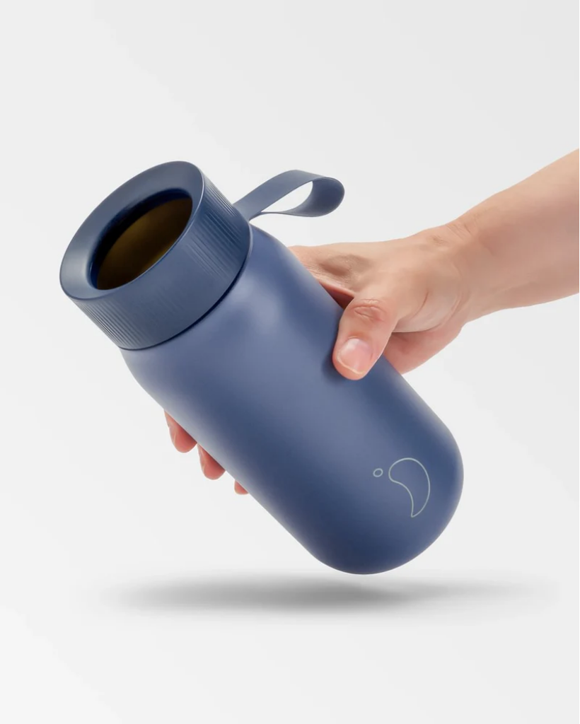 A 750 mL blue reusable insulated stainless steel bubble tea/ boba cup bottle by the brand Chillys.